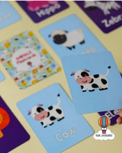 تحميل الصورة في عارض المعرض، Educational cards with animal illustrations and labels on a yellow surface.
